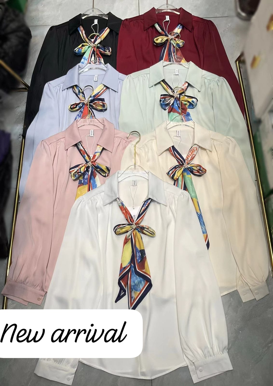 "Elegant shirt with a stylish silk scarf accent – perfect for a chic and sophisticated look"