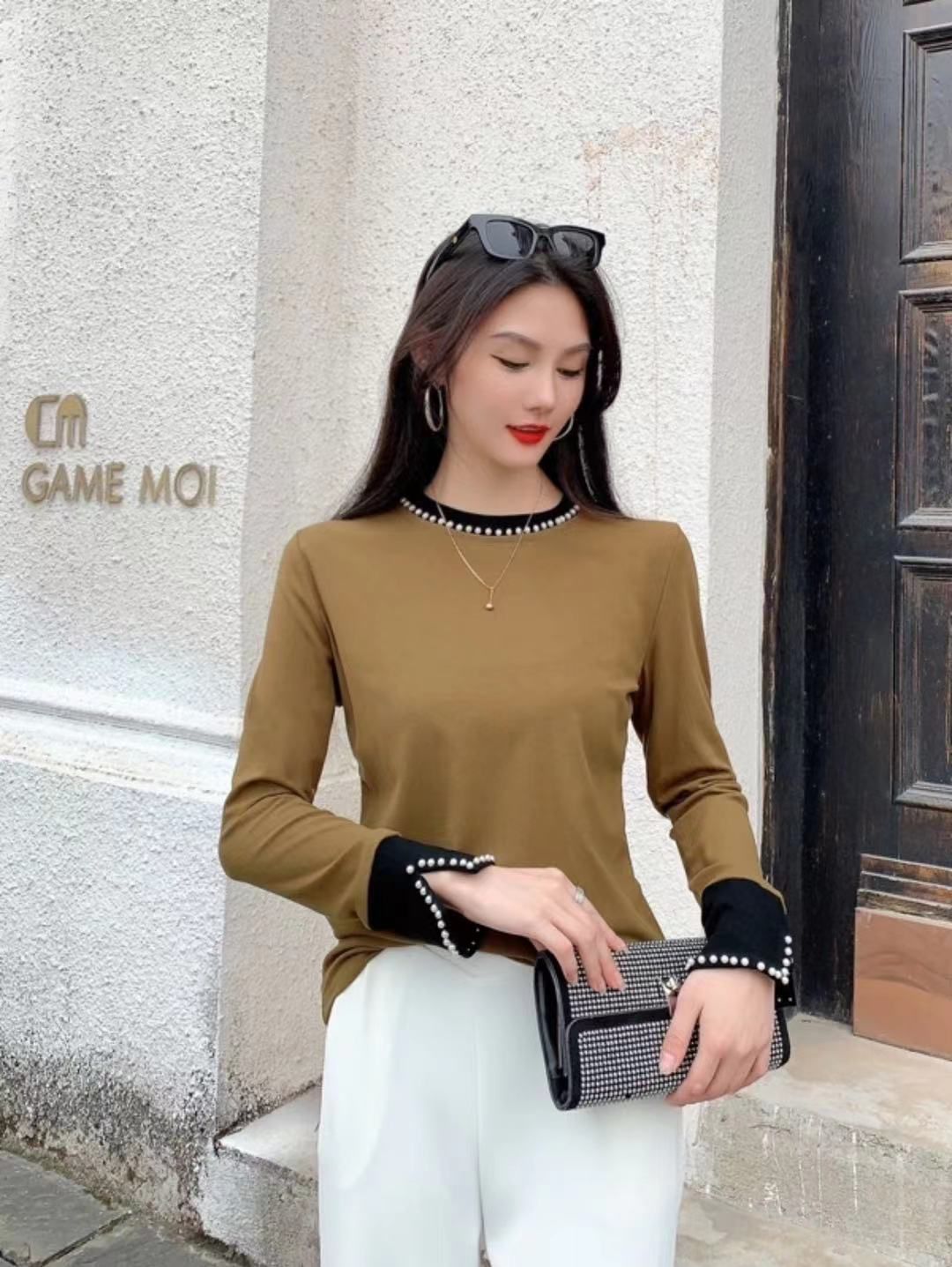 Women full sleeve top with pearl on neck n sleeves