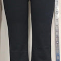 "Black Flared Pants with Subtle Sparkle Detail"