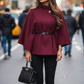 wool cape with tall boots
