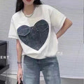 Designer top with denim detailing