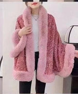 Luxurious and cozy—this fur-trimmed sequin cape