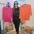 "Bold, beautiful, and effortlessly chic rhinestone top