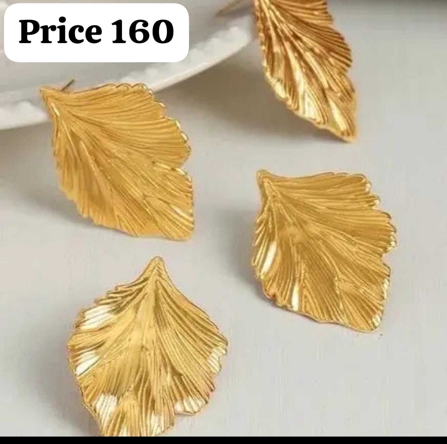 Golden Leaf Elegance statement earrings