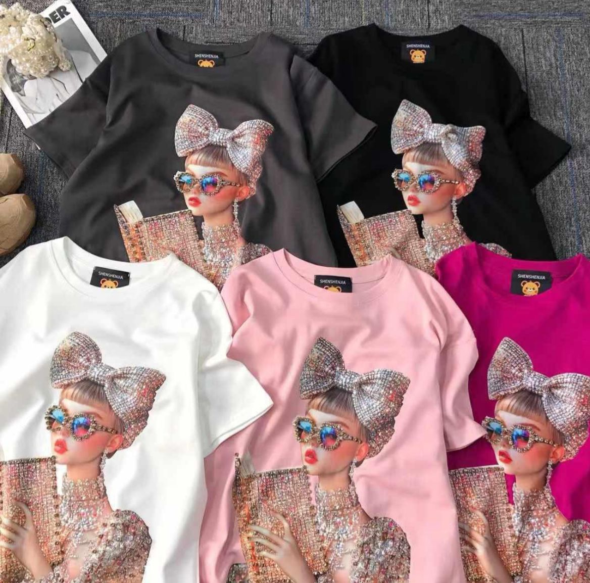 Chic oversized t-shirts with a dazzling fashionista graphic for a glam look!"