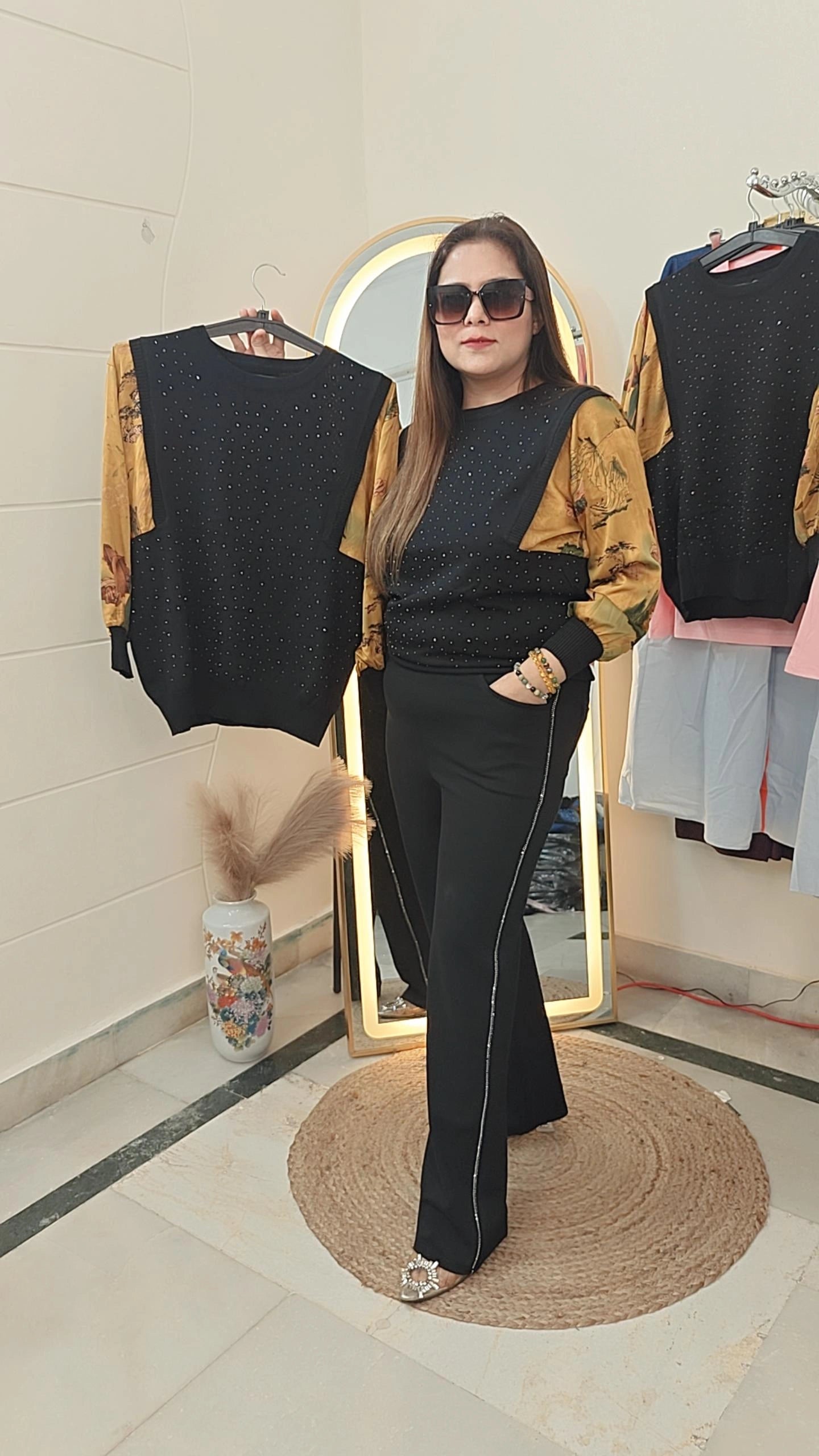 Bold Elegance: Black top  Beauty with a Touch of Gold
