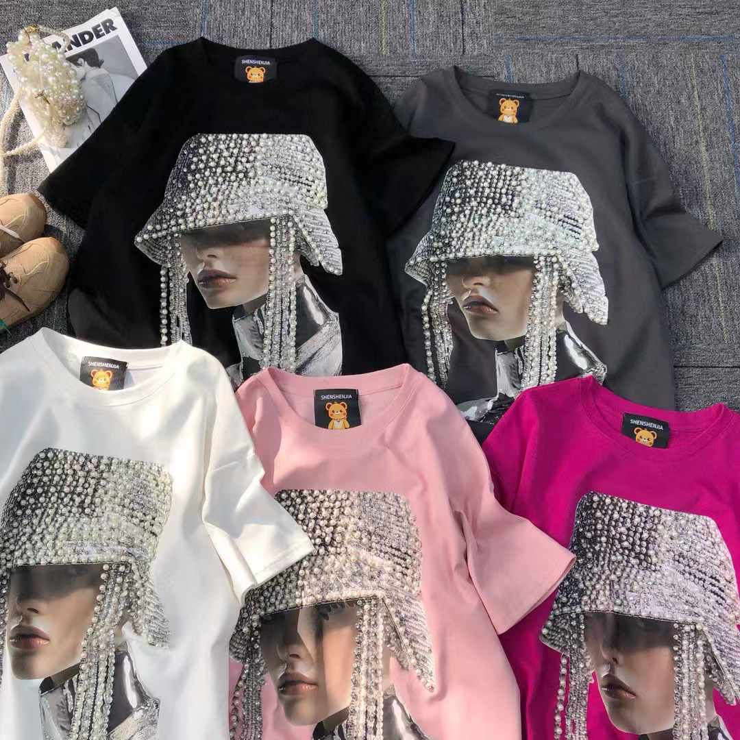 "Stylish oversized t-shirts with a dazzling embellished hat design in vibrant colors