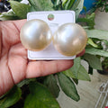 Big pearl earrings