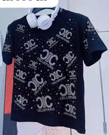 Trendy embellished tees in classic black & white!